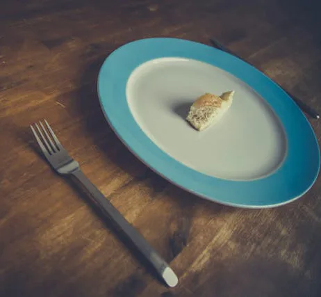 plate and fork with one food